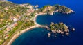 Aerial view of Isola Bella in Taormina, Sicily, Italy. Isola Bella is small island near Taormina, Sicily, Italy. Narrow path Royalty Free Stock Photo