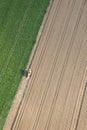 Aerial View : isolated combine harvester working
