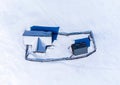 Aerial view of an isolated old house on a snow-covered field Royalty Free Stock Photo