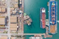 Aerial view of a jack up oil drilling rig and dry dock ship in the shipyard Royalty Free Stock Photo