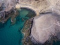 Aerial view of the jagged shores and beaches of Lanzarote, Spain, Canary. Roads and dirt paths. Papagayo beach