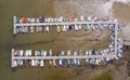 Aerial view of Jetty full of boats and dinghy