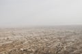 Aerial view of the Judean desert located on the West Bank of the Jordan river. Deserted shore of dead sea. The background of Royalty Free Stock Photo