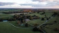 Aerial view of big mansion home in england at sunset Royalty Free Stock Photo