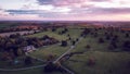 Aerial view of big mansion home in england at sunset Royalty Free Stock Photo