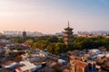 Aerial view of Kaiyuan Temple, the largest buddhist temple in Fujian Province, and West Street at dusk in Quanzhou, China