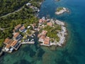 Aerial view of Kakrc in the Kotor fjord in Montenegro. Houses and buildings on the sea.