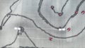 Aerial view of the karting track with moving small red karts, race and motorsport concept. Media. Top view of curves on Royalty Free Stock Photo