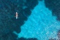 Aerial view of kayak with people in blue sea at summer sunny day Royalty Free Stock Photo