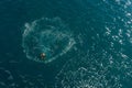 Aerial view of kids swimming at the sea. Boys swimming happily. childhood concept