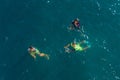 Aerial view of kids swimming at the sea. Boys swimming happily. childhood concept