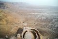 Aerial view of King Herod fortress ruins against the valley at foothills in Judean desert, Israel. Remains of ancient human Royalty Free Stock Photo