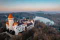 Aerial view of Konopiste,Czech fairytale castle.Picturesque autumn landscape at sunrise with impressive historical monument.Czech