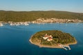 Aerial view of Kosljun monastery with Punat town in the background, Croatia