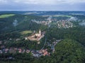 Aerial view on Krivoklat castle in protected landscape area Krivoklatsko, Czechia