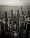 Aerial view of Kuala Lumpur City Centre in black and white.