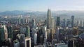 Aerial view of kuala lumpur cityscape. Drone video of asian scyscrapers. Blurred all logotypes.