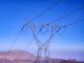 Aerial view of a 440 kv high-voltage tower in desert mountains Royalty Free Stock Photo