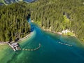 Aerial view of the Lake Braies, Pragser Wildsee is a lake in the Prags Dolomites in South Tyrol, Italy. View of rowboats moored