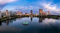 Aerial view of lake Eola and the Orlando city skyline at sunrise Royalty Free Stock Photo