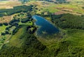 Aerial view of a lake in the forests of Lithuania, wild nature