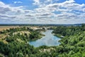 Aerial view of a lake in the mining of an open pit for sand and quartz in a forest area in the north of Germany Royalty Free Stock Photo
