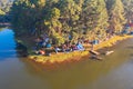 Aerial view of lakeside reservoir camping tents area, nature environment landscape. Pang Ung, Mae Hon Son, Northern, Thailand.