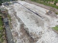 Aerial view landfill garbage waste huge dump environmental pollution problem, Top view on plastic and other industrial waste