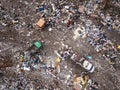 Aerial view of landfill and three trucks, environmental hazard Royalty Free Stock Photo