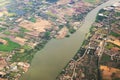 Aerial view landscape of Bangkok city and Chaopraya river in Thailand with cloud. View from air plane Royalty Free Stock Photo