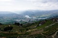 Aerial view of a landscape with buildings and a river in Casal de Loivos Miradouro, Portugal