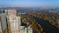 Aerial view of landscape in the city with under construction buildings and industrial cranes. Construction site. Royalty Free Stock Photo