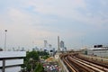 Aerial view landscape cityscape of bangkok city and high building condominium and railway track electric BTS skytrain at Victory