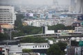 Aerial view landscape cityscape of bangkok city and high building tower condominium and railway track electric BTS skytrain and Royalty Free Stock Photo