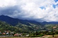 Aerial view landscape cityscape of Kundasang village valley hill and building house home with Gunung Kinabalu mountain at Kota Royalty Free Stock Photo