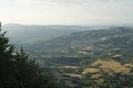 Aerial view of landscape with fields, mountains, woods on sunset. natural background. Travel concept Royalty Free Stock Photo