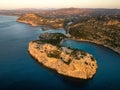 Aerial view of a landscape of giant cliffs surrounded by water