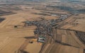 Aerial view of landscape with greenery fields and buildings