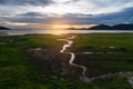 Aerial view landscape nature Water flow to river and grass background at sunset. copy space. Royalty Free Stock Photo