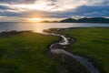 Aerial view landscape nature Water flow to river and grass background at sunset. copy space. Royalty Free Stock Photo