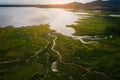 Aerial view landscape nature Water flow to river and grass background at sunset. copy space. beautiful landscape at sunset aerial Royalty Free Stock Photo