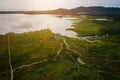 Aerial view landscape nature Water flow to river and grass background at sunset. copy space. beautiful landscape at sunset aerial Royalty Free Stock Photo