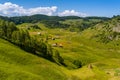 Aerial view landscape over remote village from Transylvania, Shepherd house in summer time in Romania