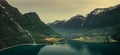 Aerial view of landscape panorama of fjord at Briksdalsbreen glacier in Jostedalsbreen mountains during summer sunrise Royalty Free Stock Photo