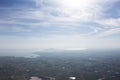 Aerial view landscape and rice field or paddy land from Khao Phraya Doen Thong viewpoint with valley village hill and clouds sky Royalty Free Stock Photo