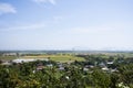 Aerial view landscape and rice field or paddy land from viewpoint of Wat Khao Sanam Chaeng temple with valley village hill for