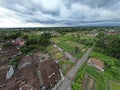 From the aerial view, the landscape in Yogyakarta unfolds with a captivating blend of chili pepper gardens and houses