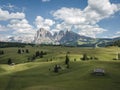 Aerial View of the landscapes in Alpe di Siusi in summer, Natural landscapes in Dolomites with Sassolungo or Langkofel Mountain Gr Royalty Free Stock Photo