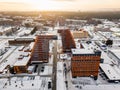 Aerial view of a large building with laboratories and innovative projects, technical inventions covered with snow on a winter day