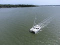 Aerial view of a large catamaran moving off the coast of South Carolina